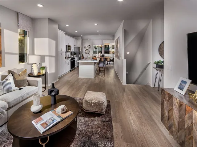 a living room with furniture and a table