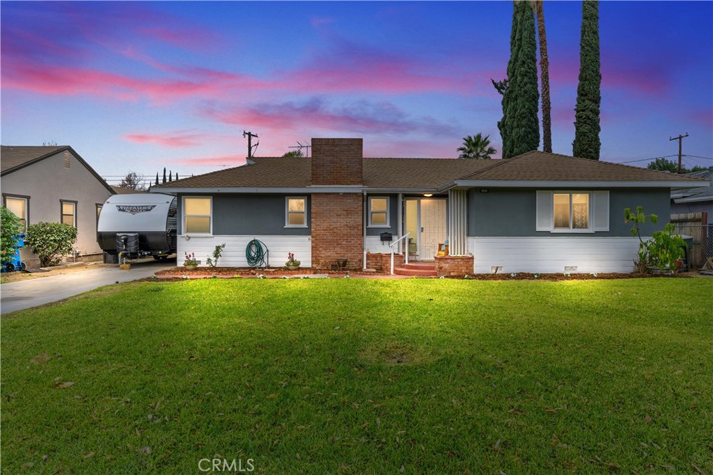 5535 Tower Road Riverside, CA 92506 - Photo 1 of 1 a front view of a house with a garden and plants