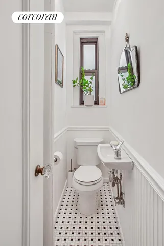 a kitchen with stainless steel appliances a refrigerator sink and cabinets