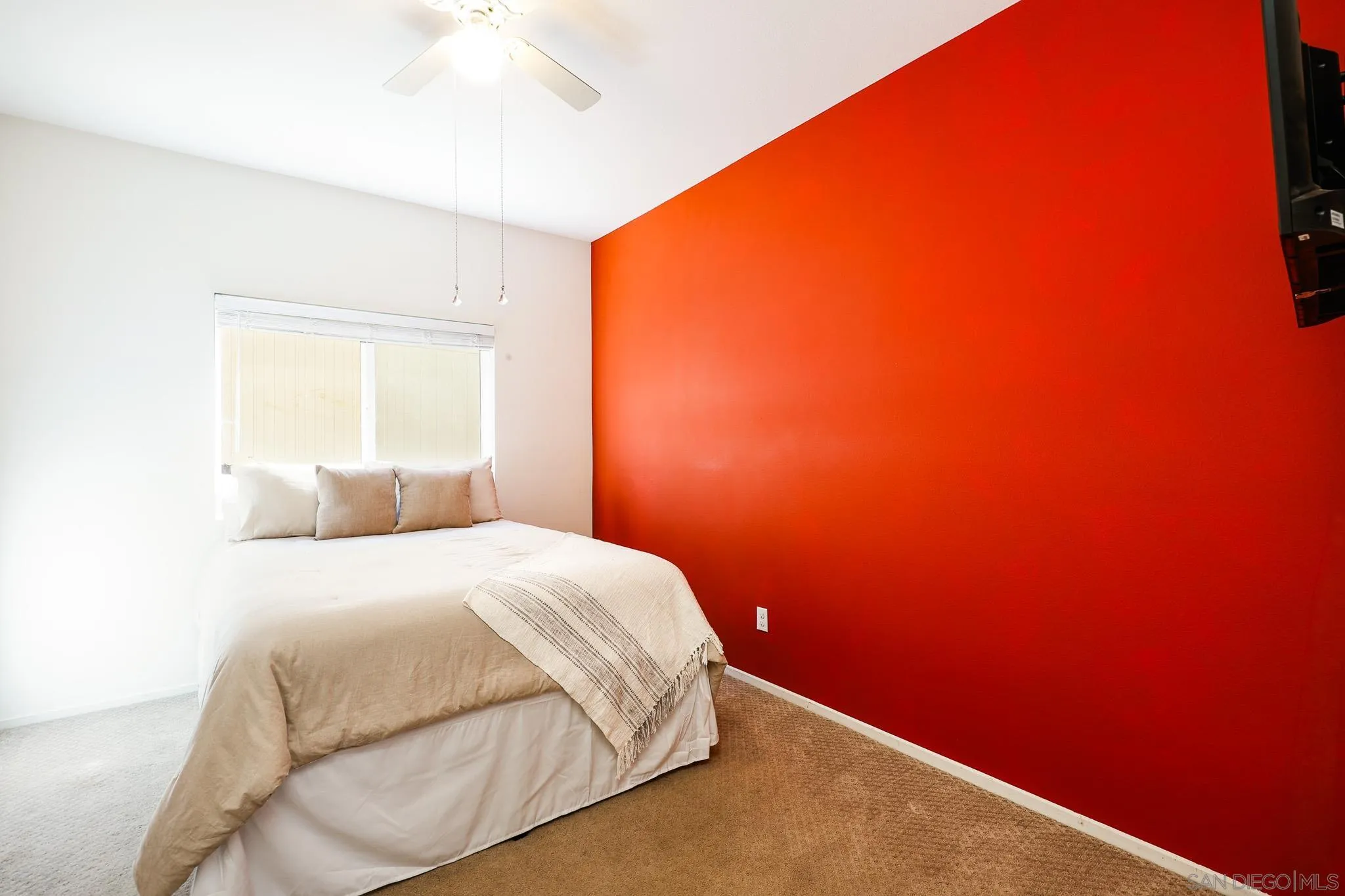 310 Falabella Lane Fallbrook, CA 92028 - Photo 17 of 48 a bedroom with a bed and a window