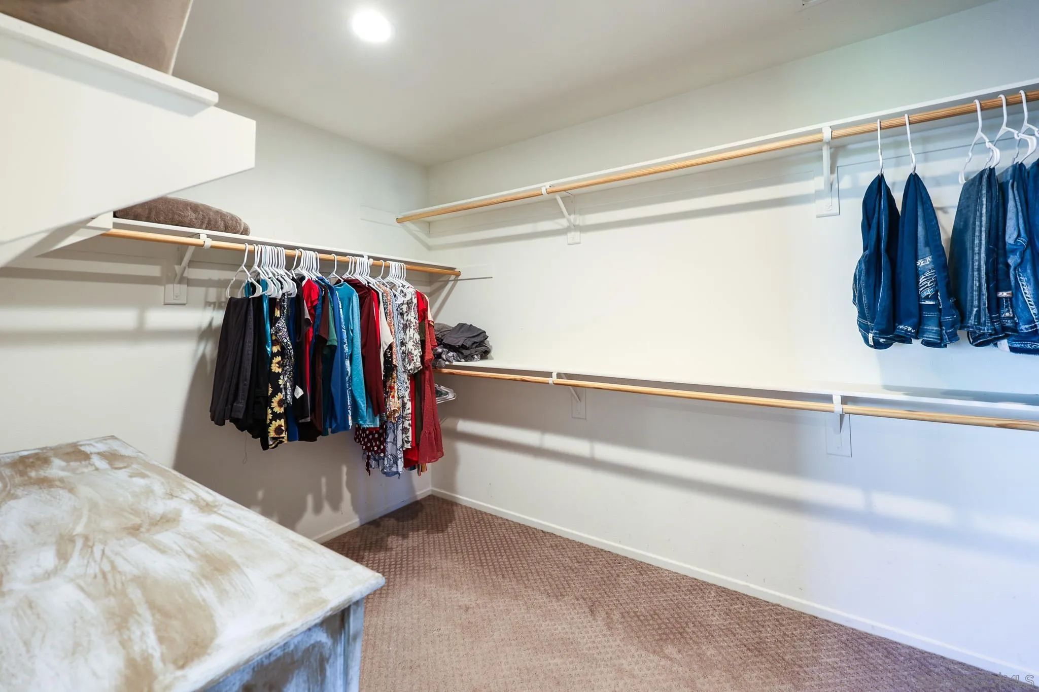 310 Falabella Lane Fallbrook, CA 92028 - Photo 25 of 48 a view of walk in closet with clothes and shoes