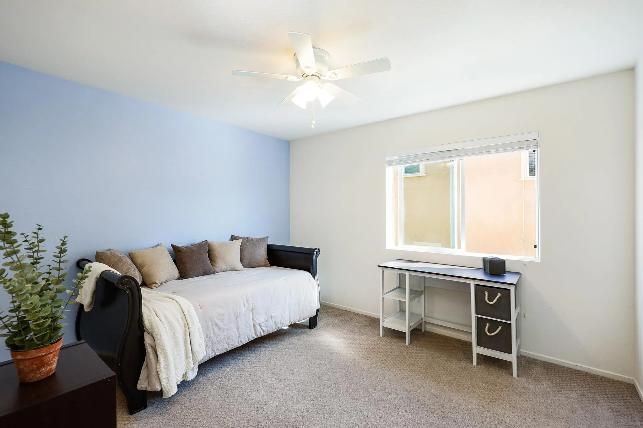 310 Falabella Lane Fallbrook, CA 92028 - Photo 26 of 48 a living room with a bed furniture and a window