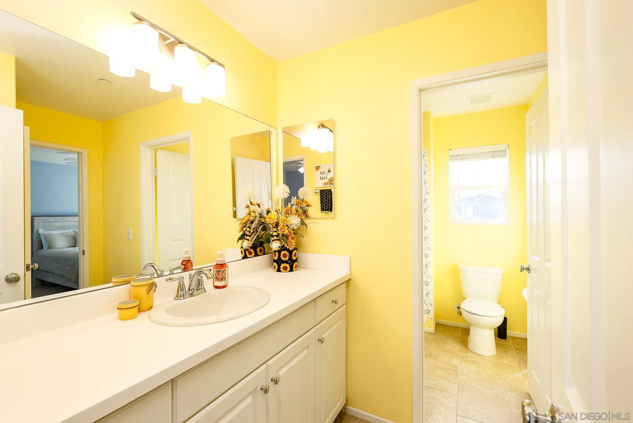 310 Falabella Lane Fallbrook, CA 92028 - Photo 27 of 48 a bathroom with a sink and a mirror