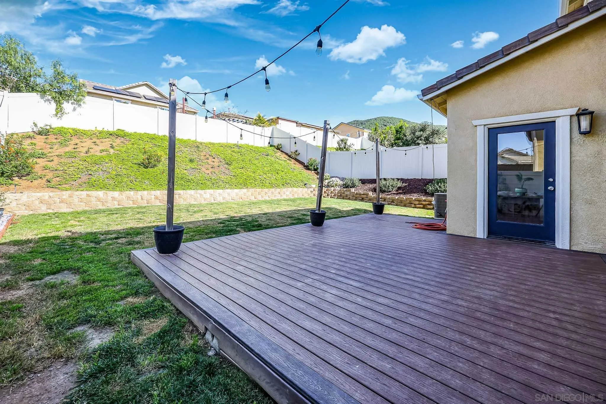 310 Falabella Lane Fallbrook, CA 92028 - Photo 30 of 48 a view of a patio with a table and chairs