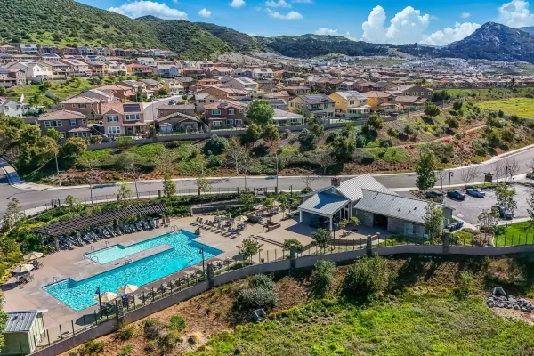 an aerial view of a house with a lake view