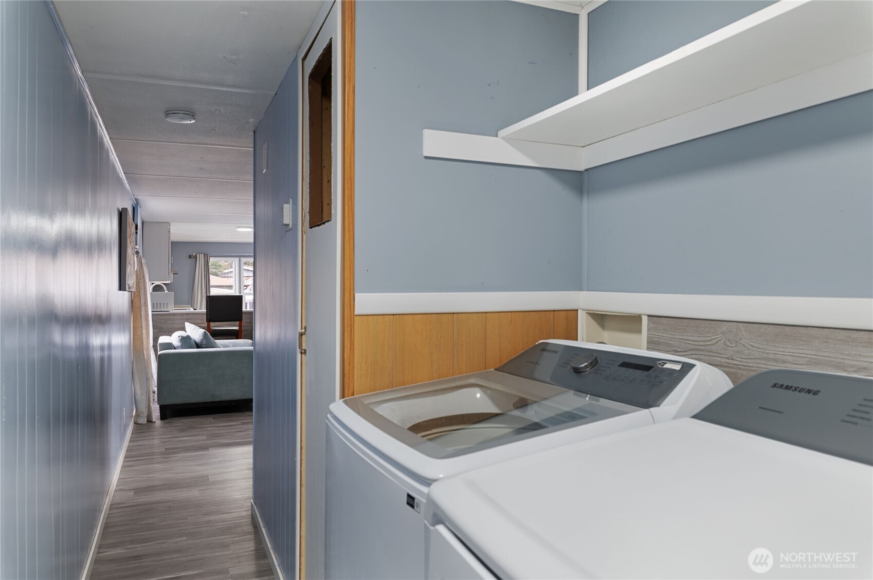 3060 Northeast McWilliams Road, Unit 122 Bremerton, WA 98311 - Photo 15 of 20 a kitchen that has a microwave and a stove