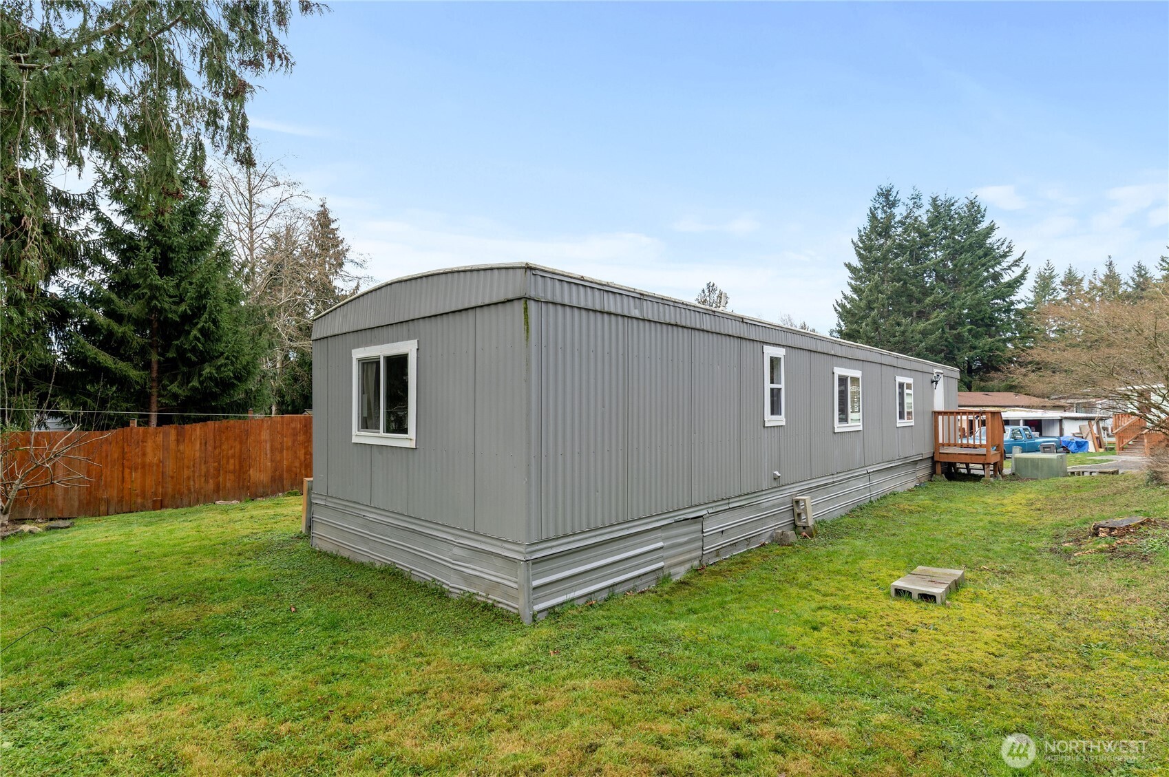3060 Northeast McWilliams Road, Unit 122 Bremerton, WA 98311 - Photo 19 of 20 a view of a backyard with a garden