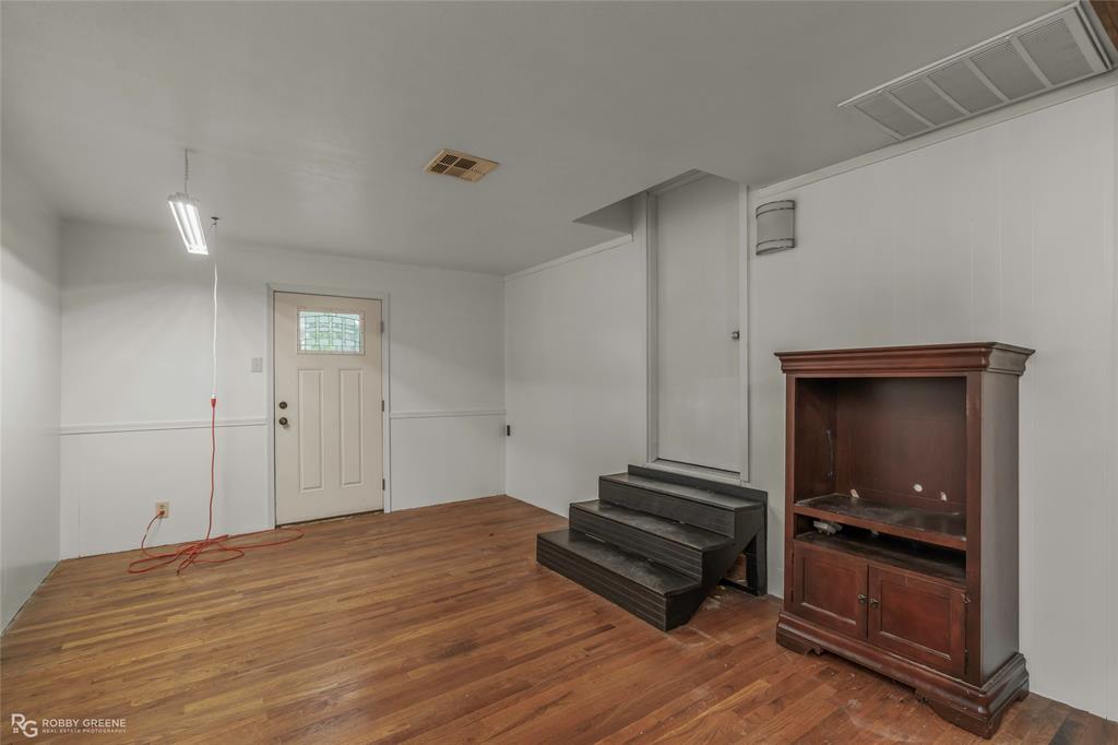 5725 Harper Road Keithville, LA 71047 - Photo 18 of 35 a view of empty room with wooden floor