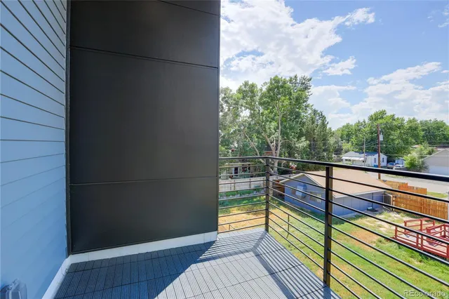 a view of balcony with two chairs
