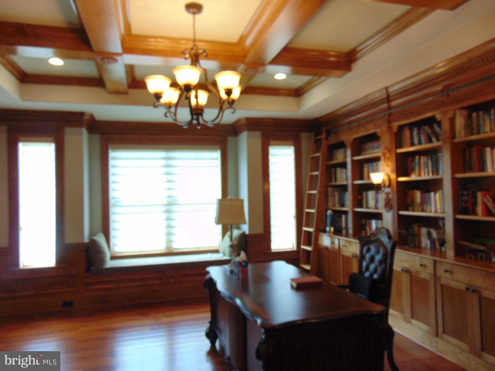1027 Towlston Road McLean, VA 22102 - Photo 23 of 59 a view of a dining room with furniture window and wooden floor