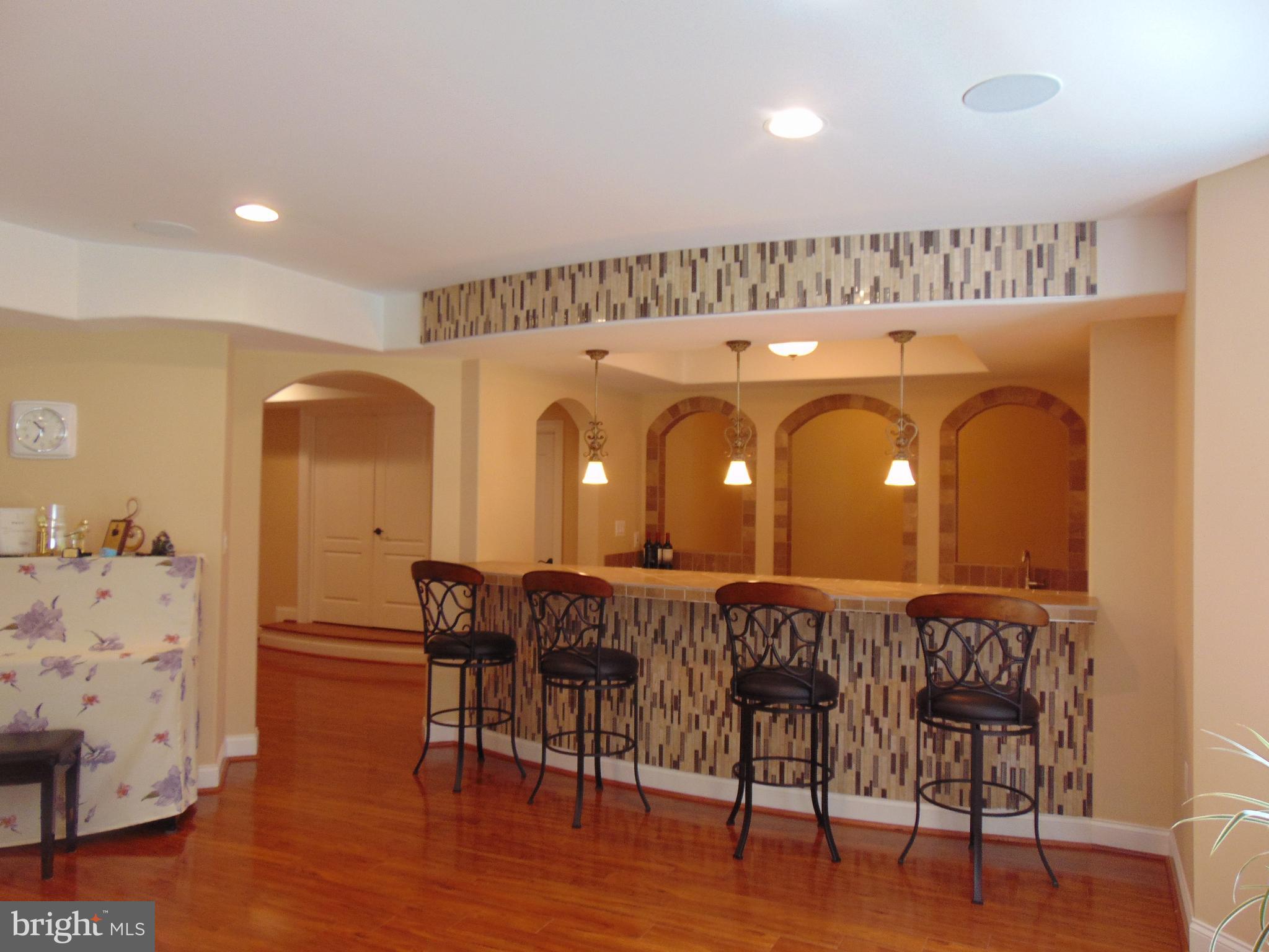 1027 Towlston Road McLean, VA 22102 - Photo 27 of 59 a view of a a dining room with furniture window and wooden floor