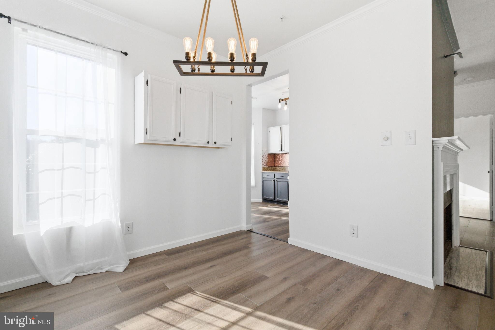 20419 Riverbend Square, Unit 200 Sterling, VA 20165 - Photo 13 of 39 a view of empty room with wooden floor