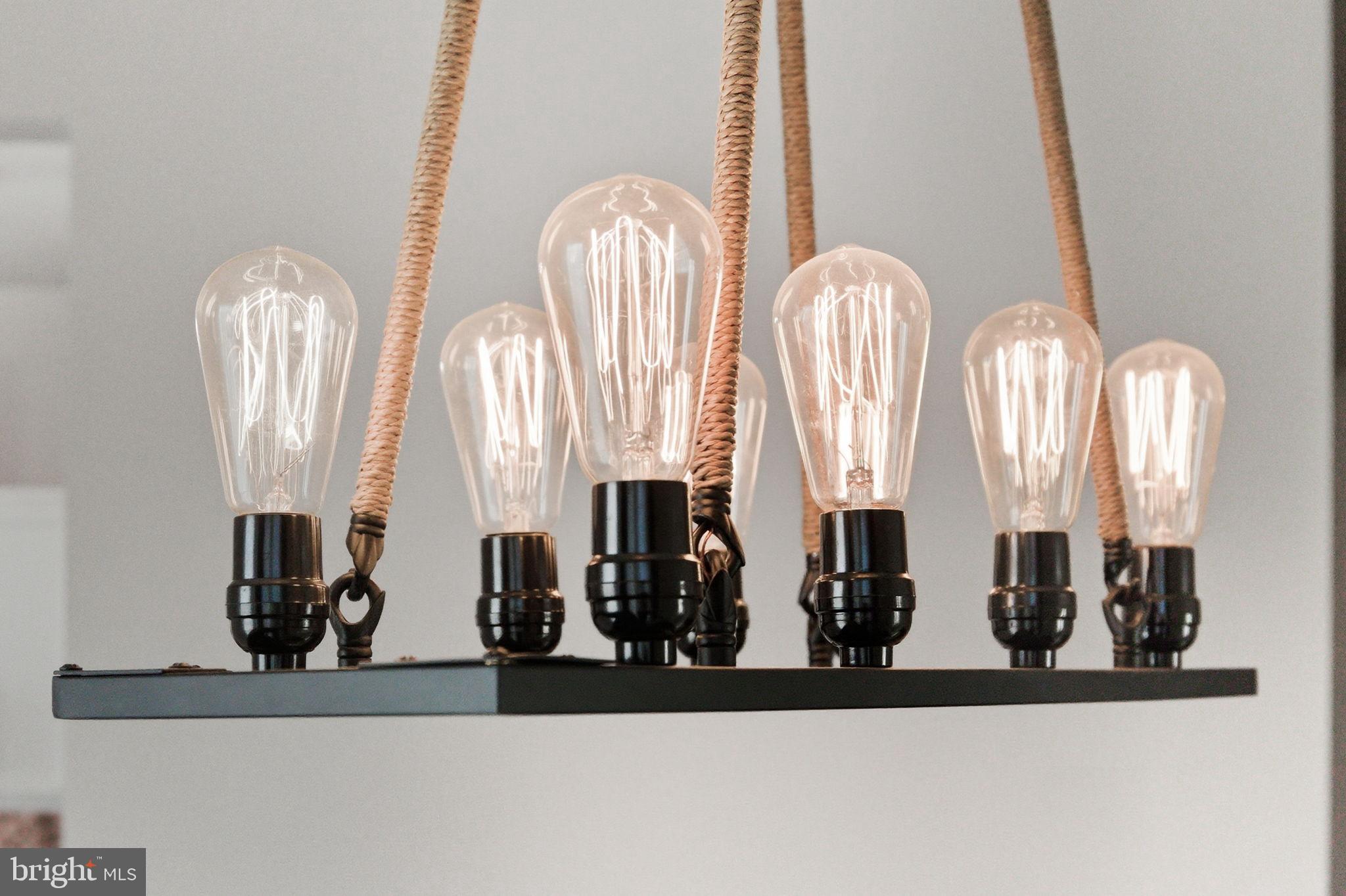 20419 Riverbend Square, Unit 200 Sterling, VA 20165 - Photo 34 of 39 a view of a living room with bathroom and mirror