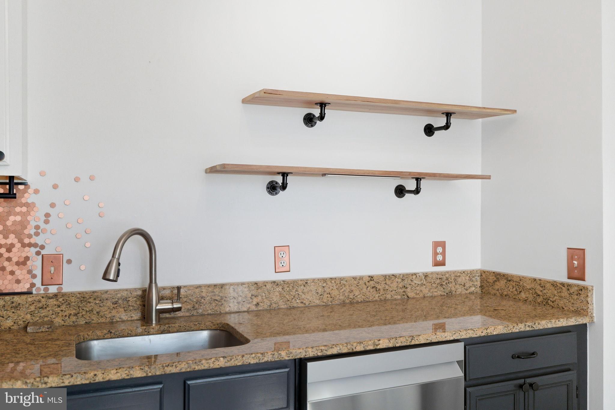 20419 Riverbend Square, Unit 200 Sterling, VA 20165 - Photo 37 of 39 a close view of sink and tap