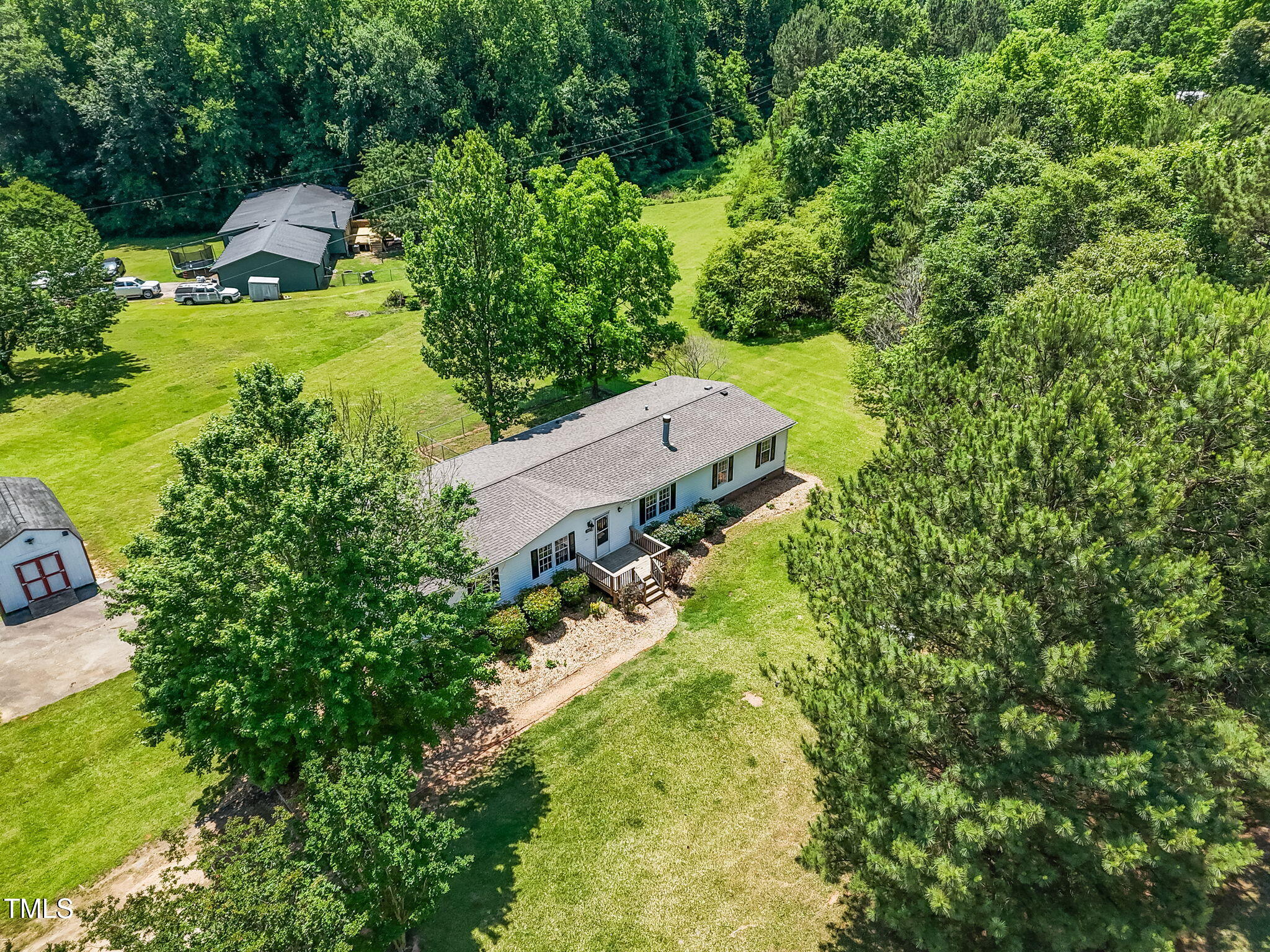 496 Creech Johnson Road Zebulon, NC 27597 - Photo 2 of 42 36-web-or-mls-DJI_20250520122745_0300_D