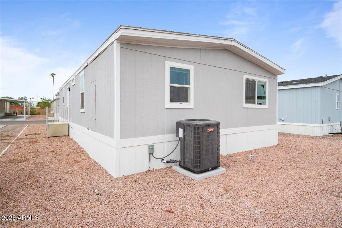 320 East McKellips Road, Unit 211 Mesa, AZ 85201 - Photo 27 of 27 a view of a house with a outdoor space