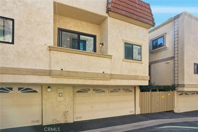 a view of a kitchen with a sink and a dishwasher