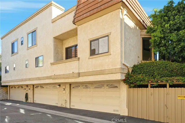 a front view of a house with a garage