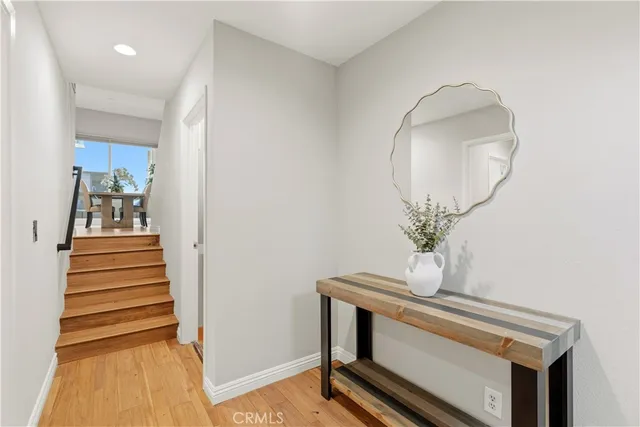 a view of entryway with wooden floor
