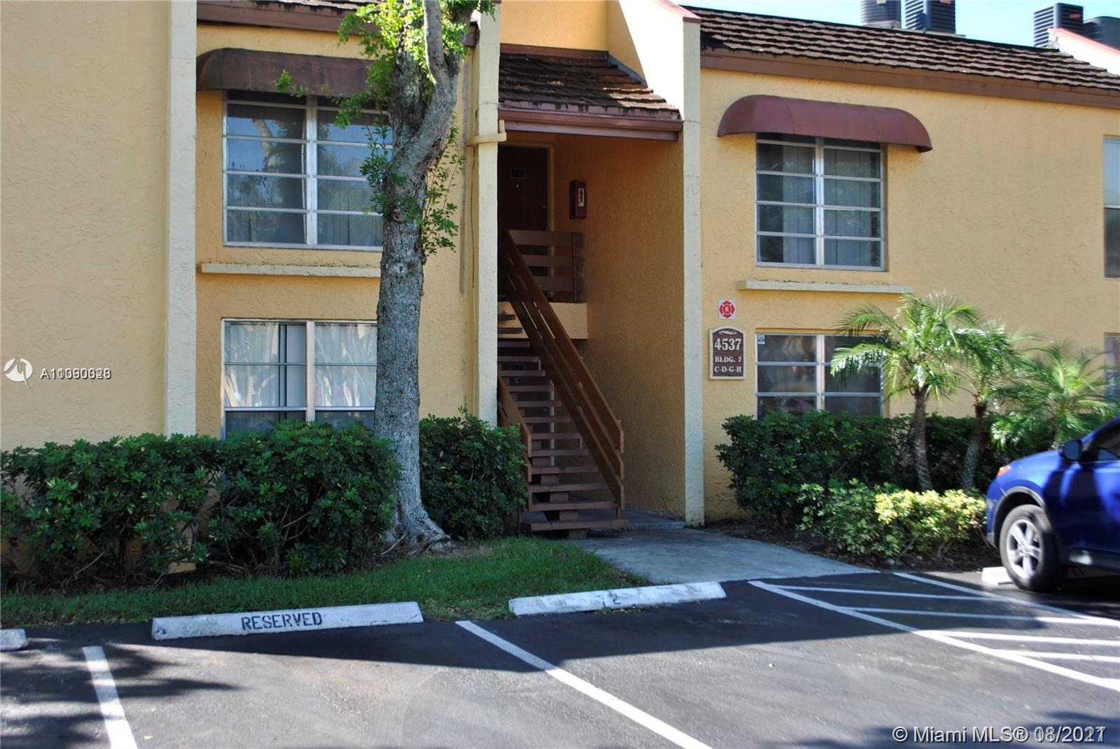 4537 Treehouse Lane, Unit C Tamarac, FL 33319 - Photo 3 of 11 front view of a house