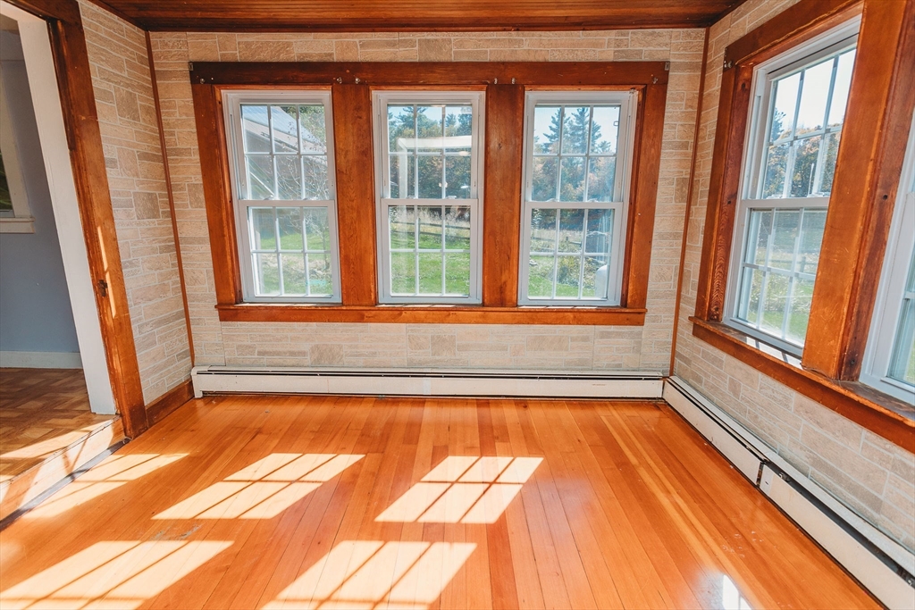 163 Hazelton Road Rowe, MA 01367 - Photo 13 of 40 a view of a bathtub in a room next to a window