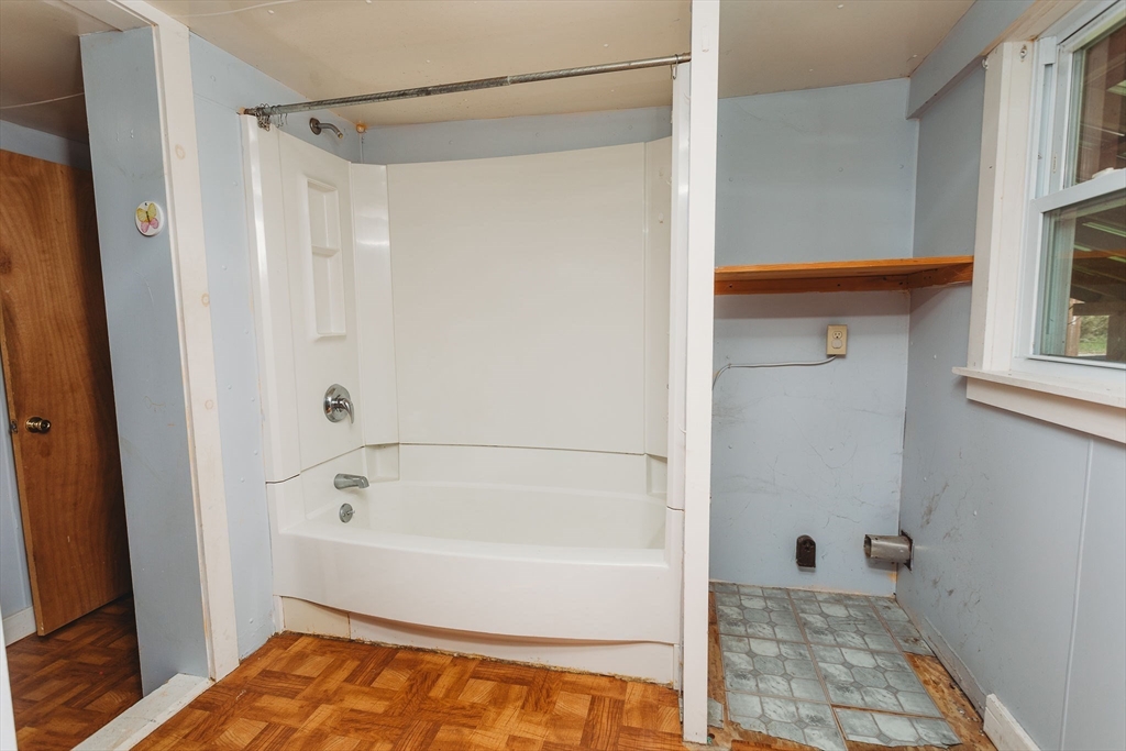 163 Hazelton Road Rowe, MA 01367 - Photo 15 of 40 a bathroom with a bathtub and a shower