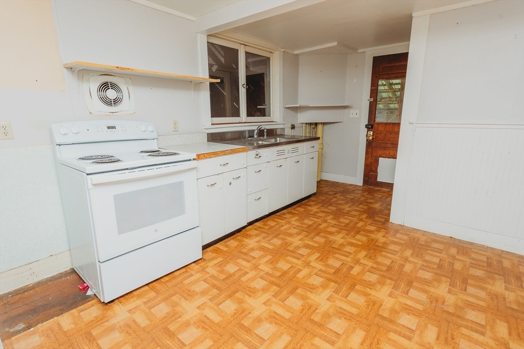 163 Hazelton Road Rowe, MA 01367 - Photo 17 of 40 a kitchen with a sink cabinets and appliances