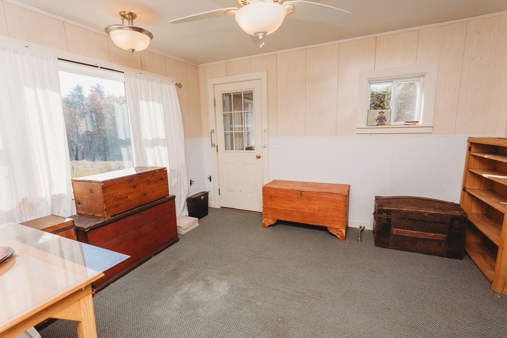 163 Hazelton Road Rowe, MA 01367 - Photo 24 of 40 a bedroom with furniture and a window