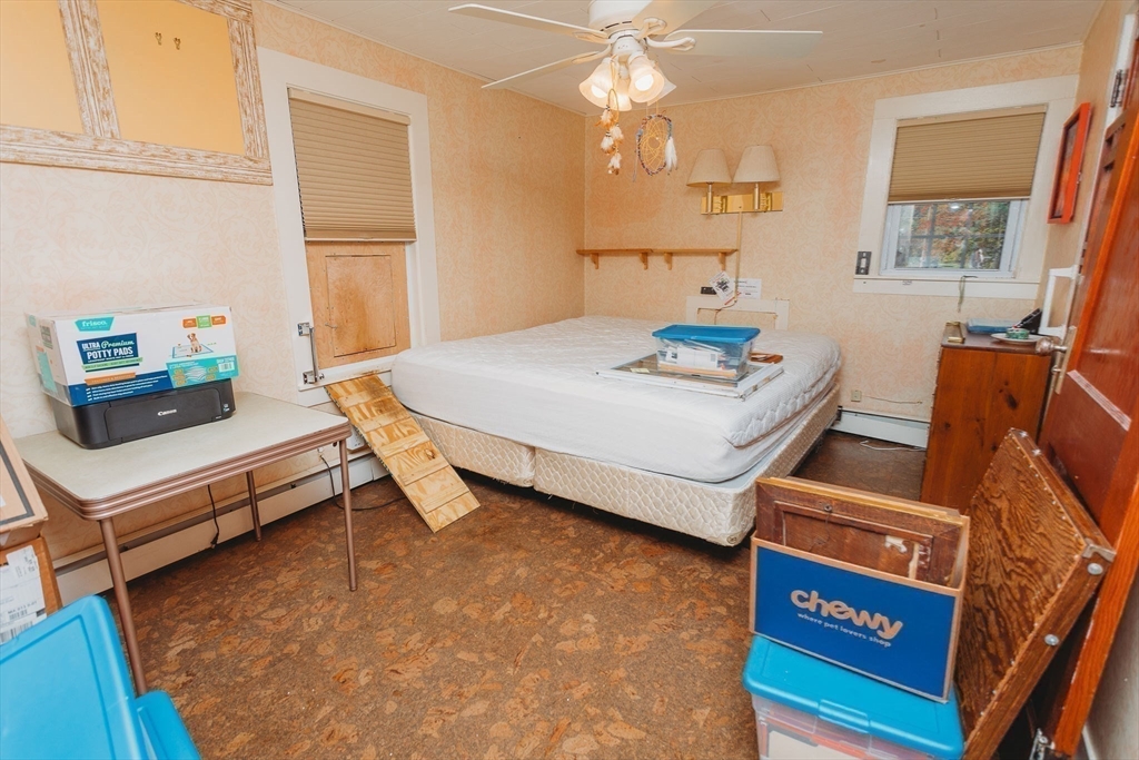 163 Hazelton Road Rowe, MA 01367 - Photo 25 of 40 a bedroom with furniture and a baby crib