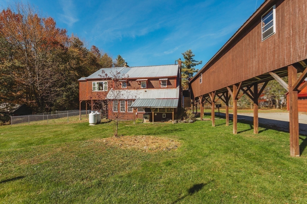 163 Hazelton Road Rowe, MA 01367 - Photo 29 of 40 a house view with a garden space