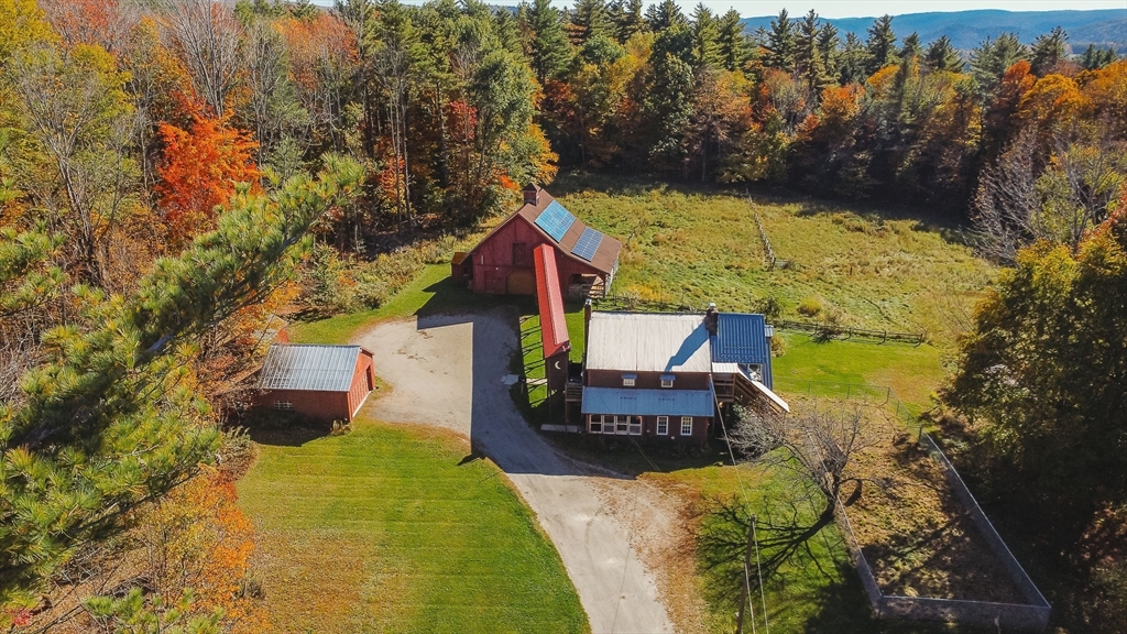 163 Hazelton Road Rowe, MA 01367 - Photo 3 of 40 a view of a house with a yard