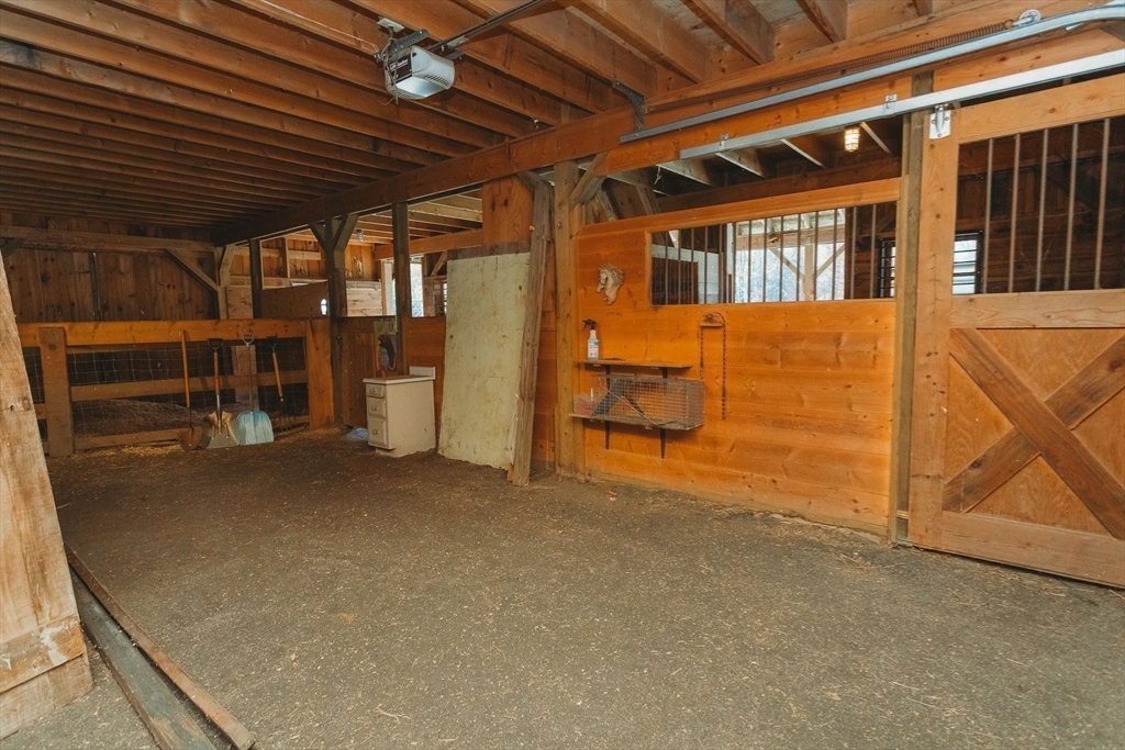 163 Hazelton Road Rowe, MA 01367 - Photo 35 of 40 a view of a room with wooden walls
