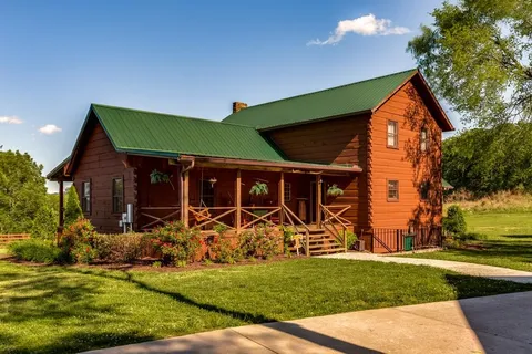 a front view of house with patio