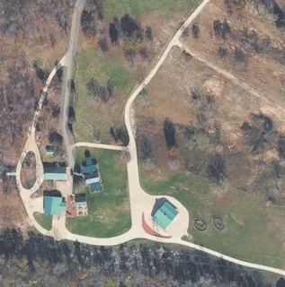 a view of barn with a small yard