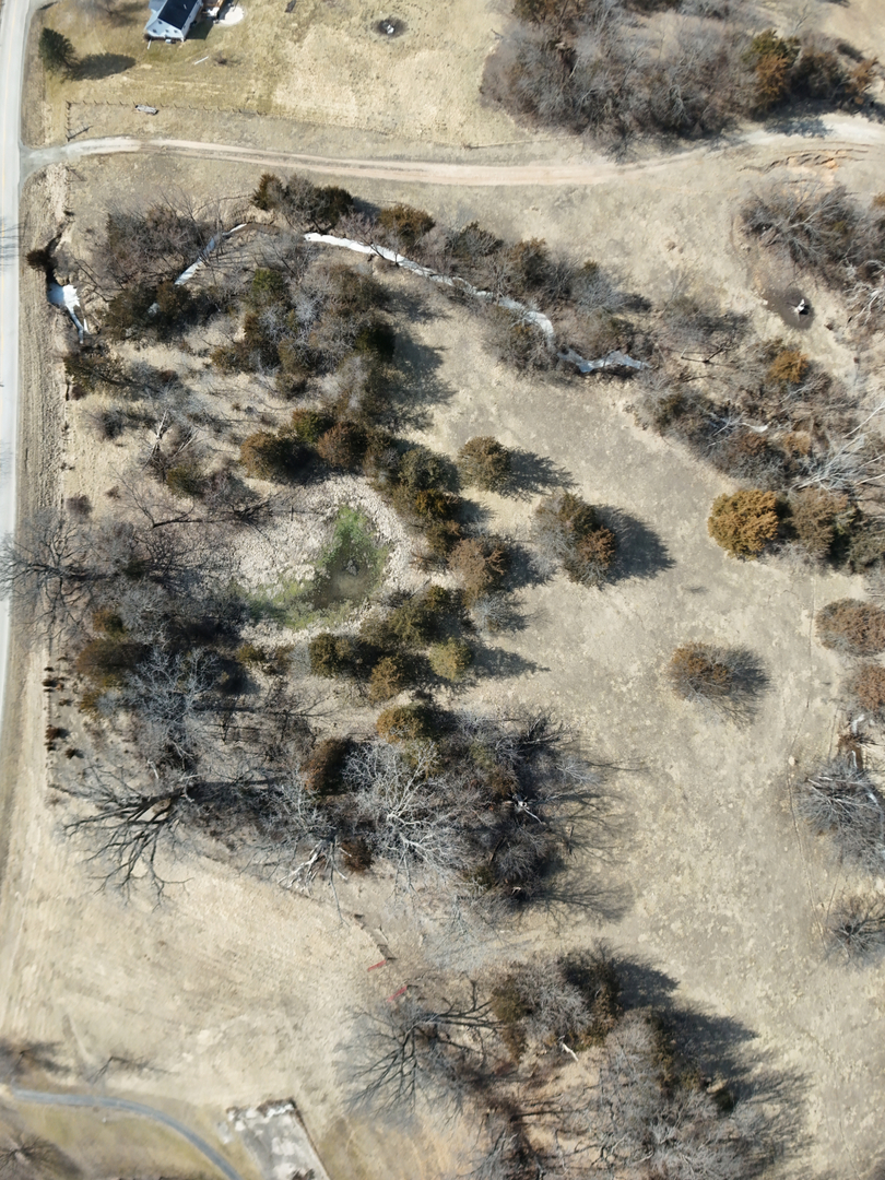 0 Spring Valley Road Fulton, IL 61252 - Photo 6 of 15 a view of a dry yard covered with snow on the road
