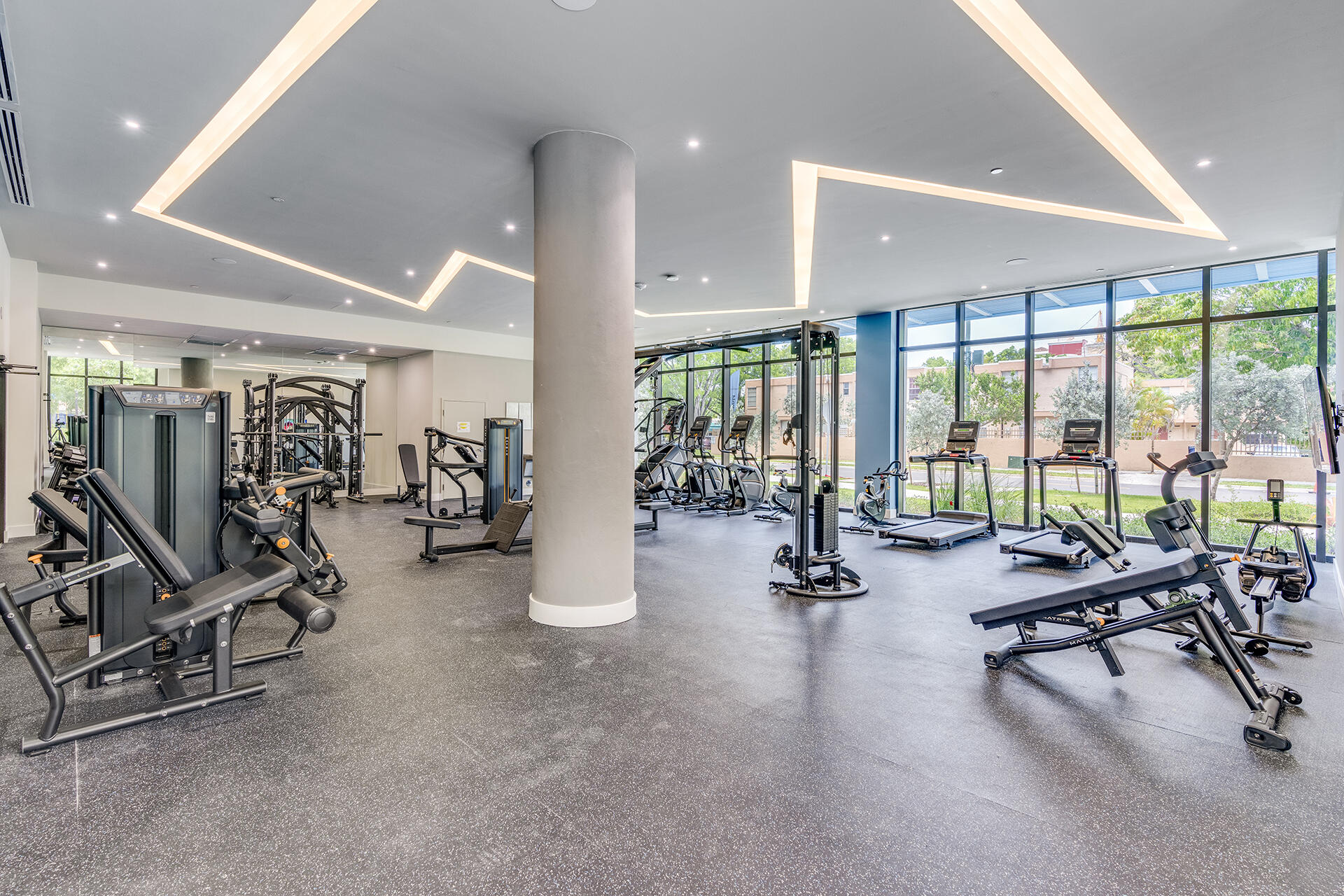 5961 Southwest 68th Street, Unit 718 South Miami, FL 33143 - Photo 18 of 20 a view of a room with gym equipment
