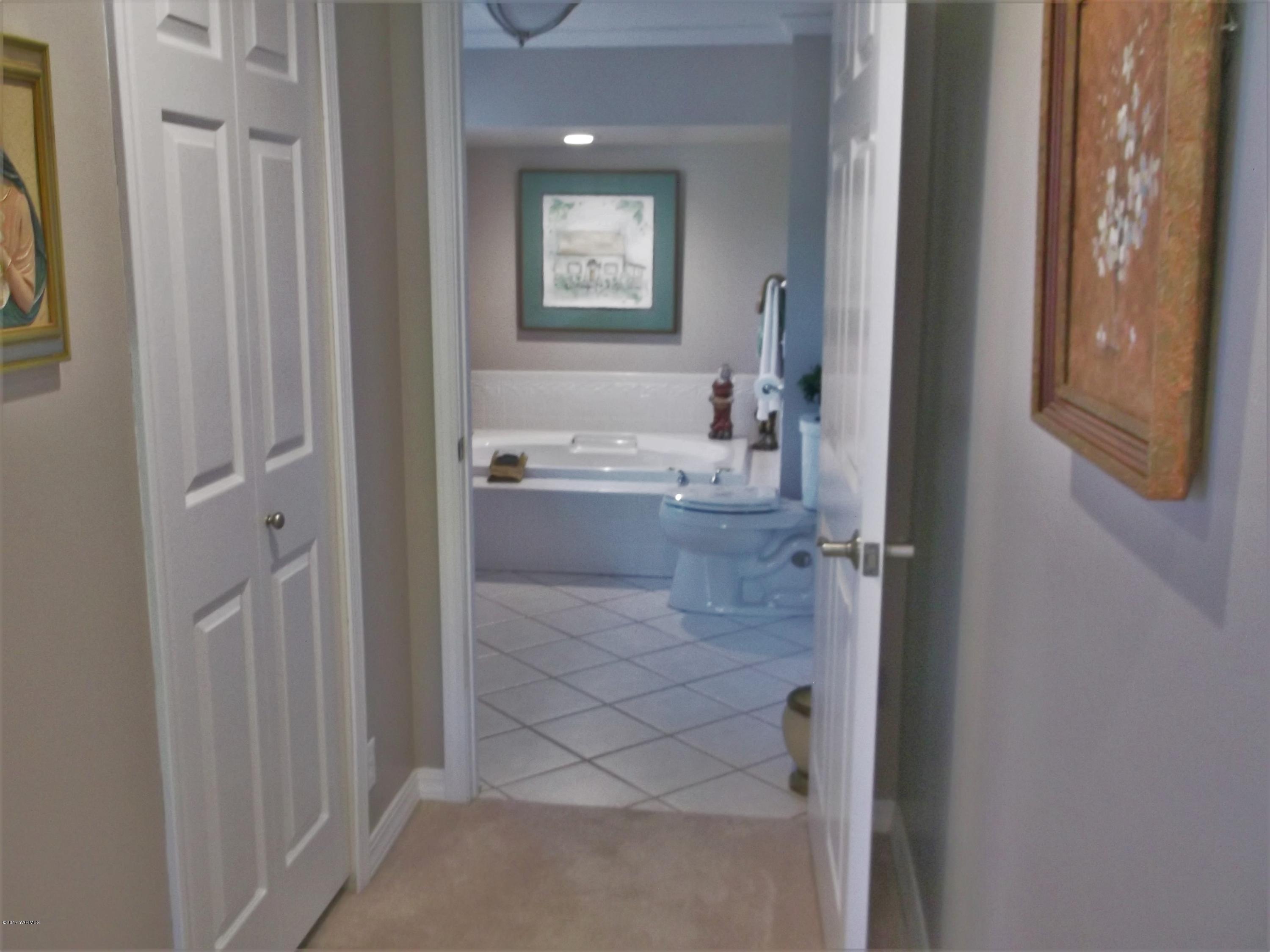 2000 Hornby Road Grandview, WA 98930 - Photo 20 of 45 a bathroom with a sink a bathtub and a shower