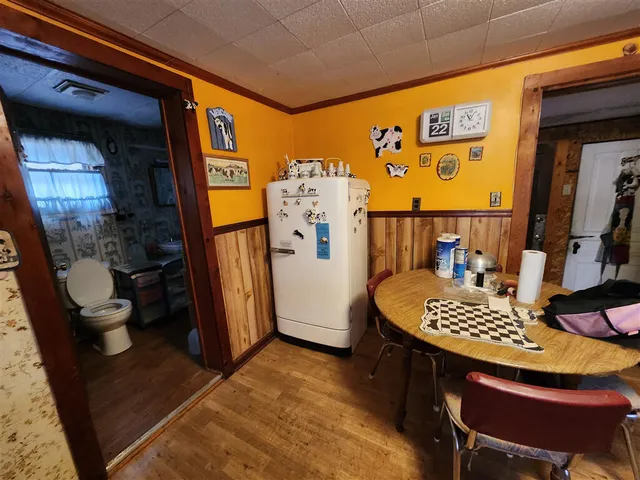 a view of a dining room with furniture
