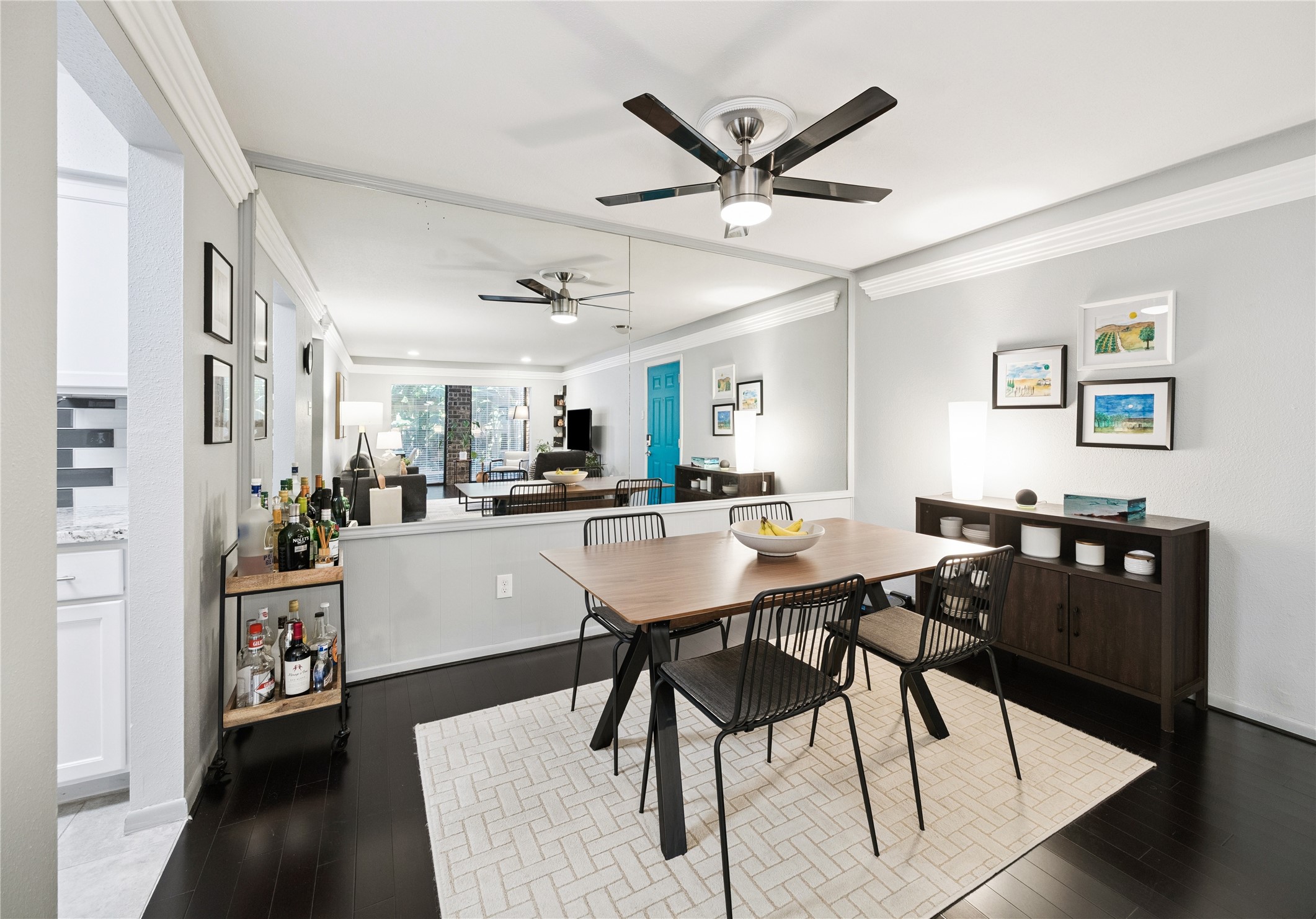 7555 Katy Freeway, Unit 50 Houston, TX 77024 - Photo 4 of 13 a view of a dining room with furniture and wooden floor