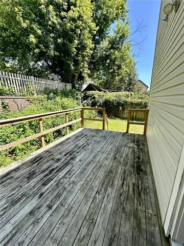 a view of a balcony with an outdoor space