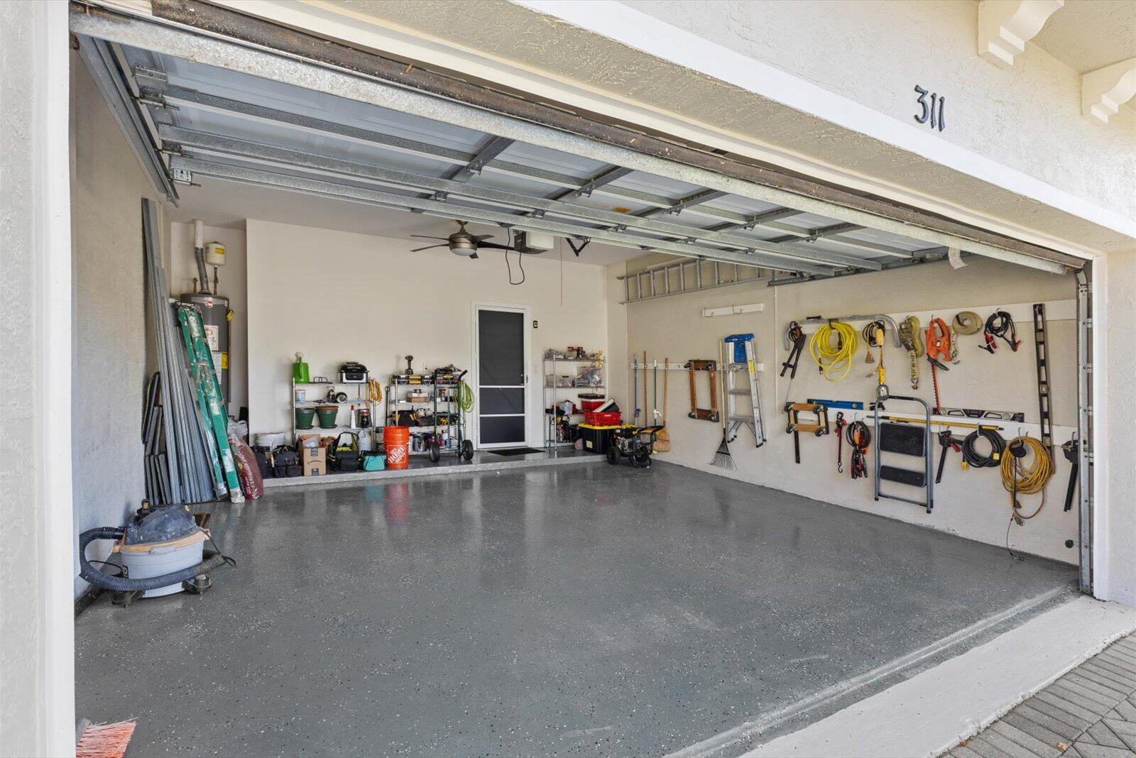 311 Southwest Coconut Key Way Port St. Lucie, FL 34986 - Photo 25 of 25 a view of a room with gym equipment