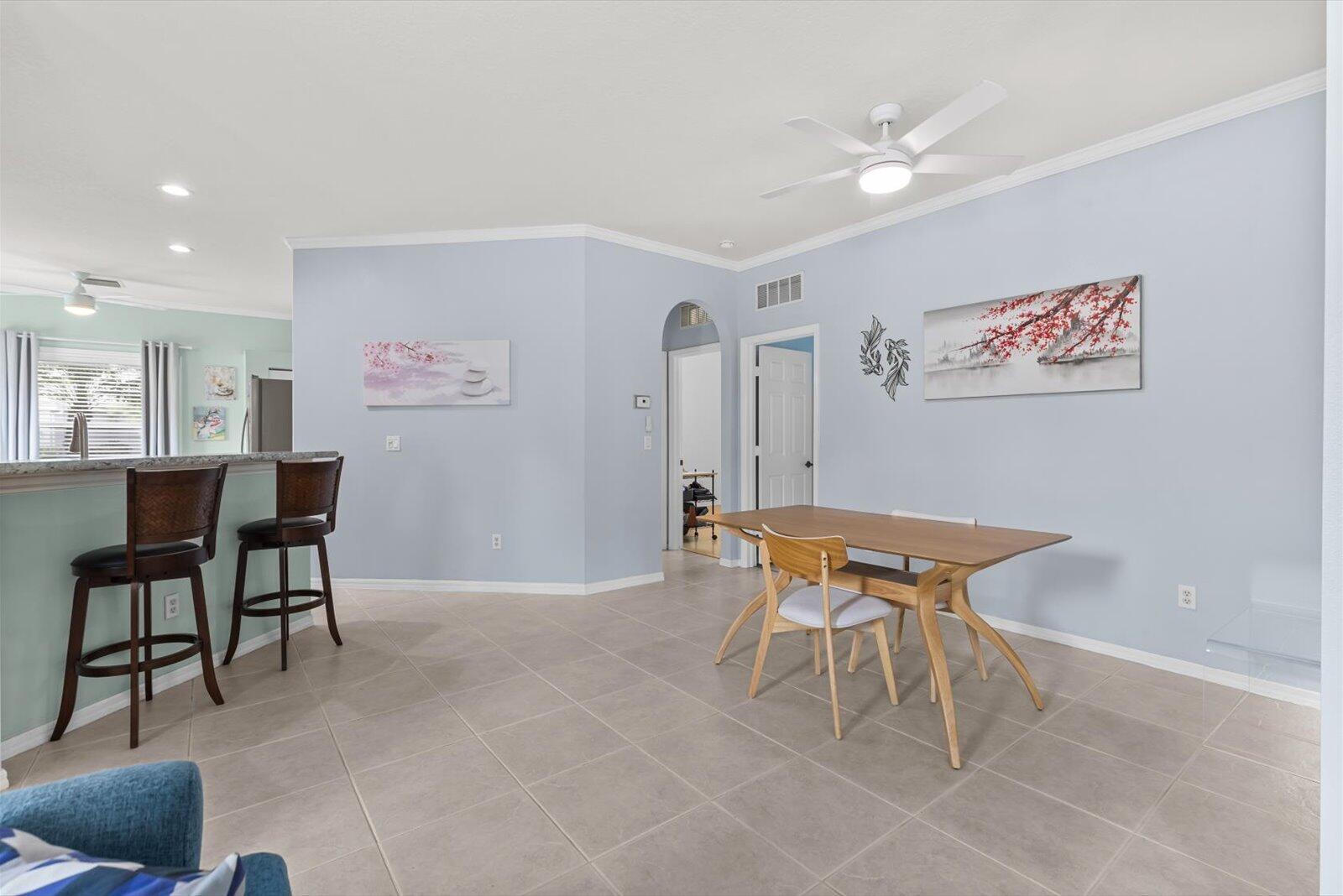 311 Southwest Coconut Key Way Port St. Lucie, FL 34986 - Photo 7 of 25 a dining room with furniture and window