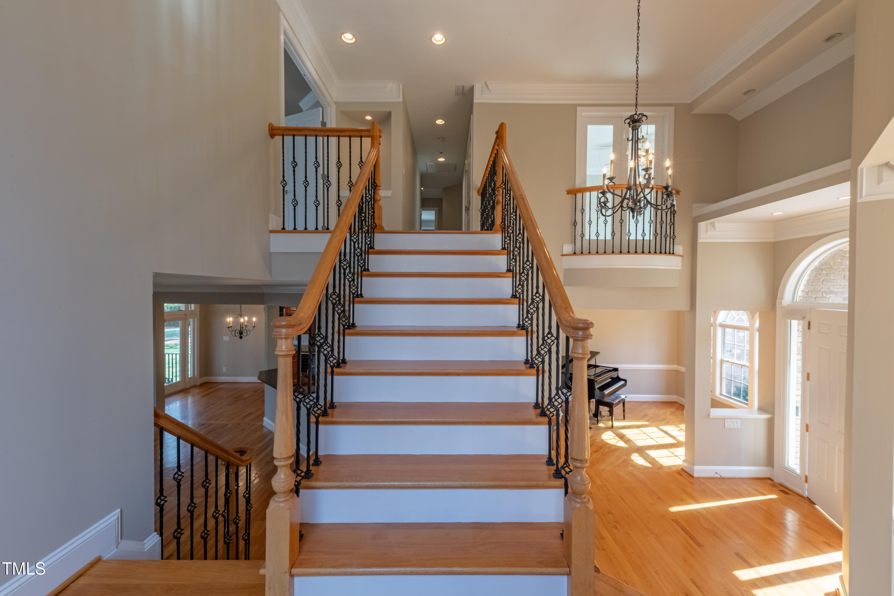 1408 Goldengate Court Raleigh, NC 27613 - Photo 26 of 64 a view of entryway and hall with wooden floor