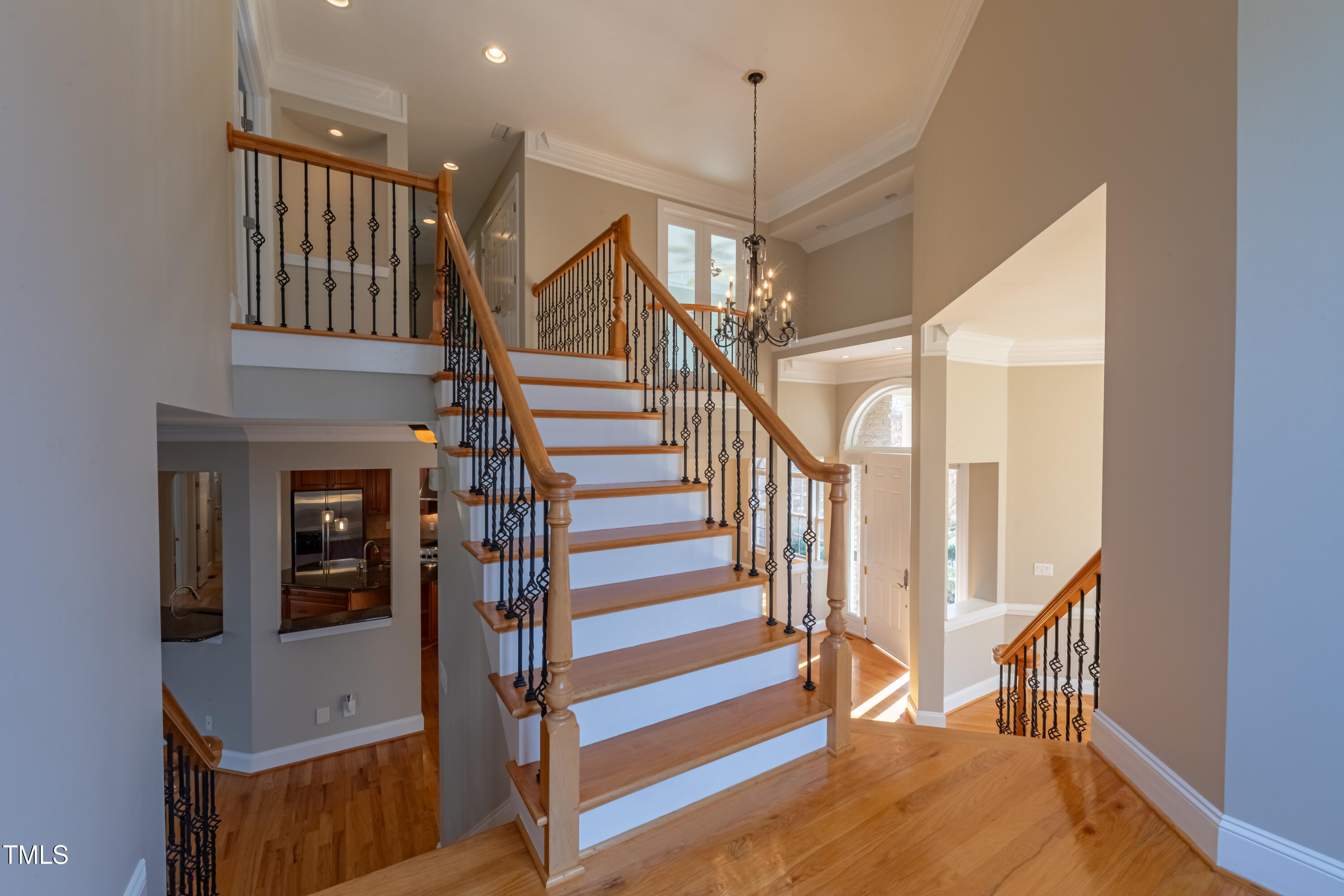 1408 Goldengate Court Raleigh, NC 27613 - Photo 27 of 64 a view of entryway and hall with wooden floor