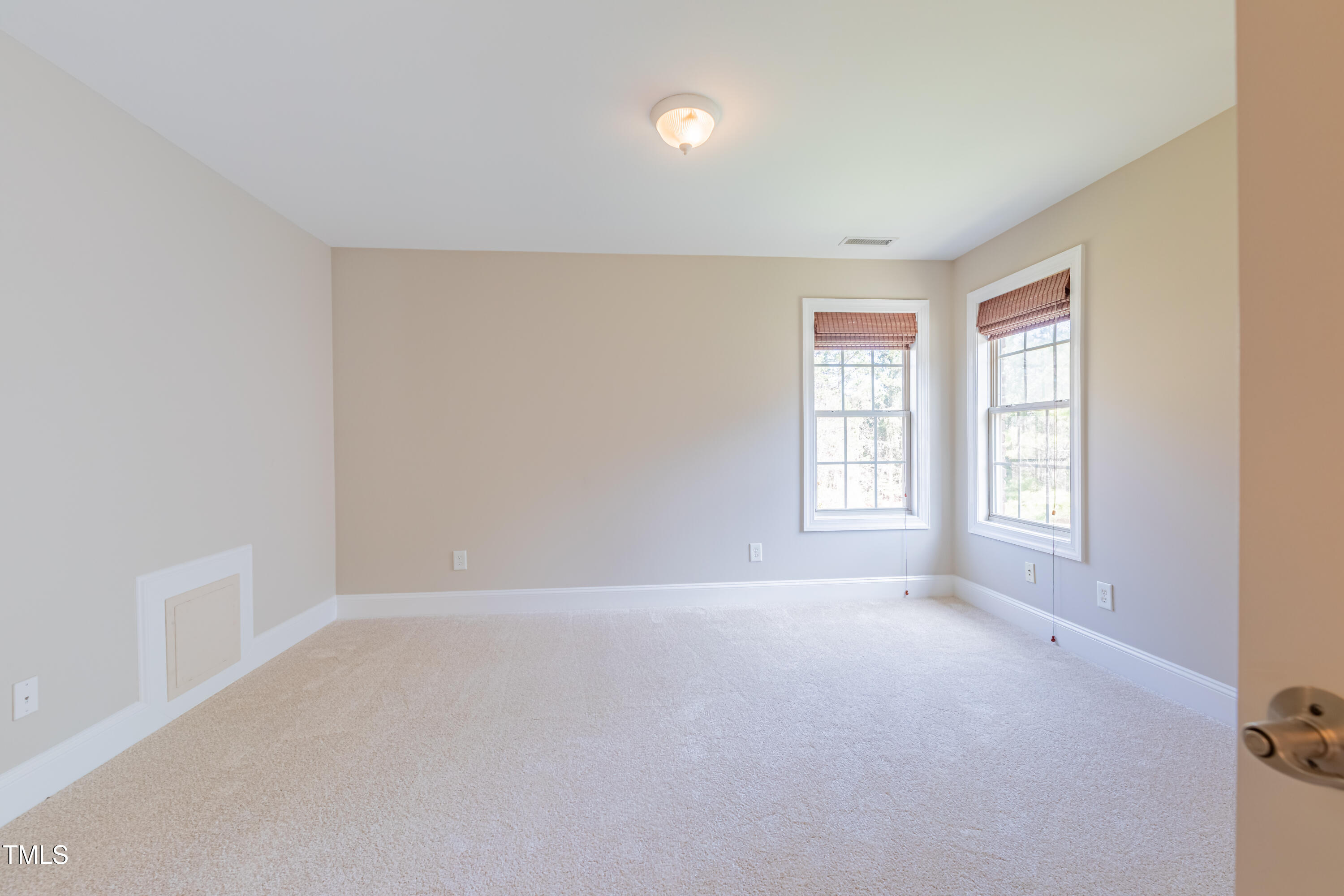 1408 Goldengate Court Raleigh, NC 27613 - Photo 46 of 64 a view of an empty room with a window