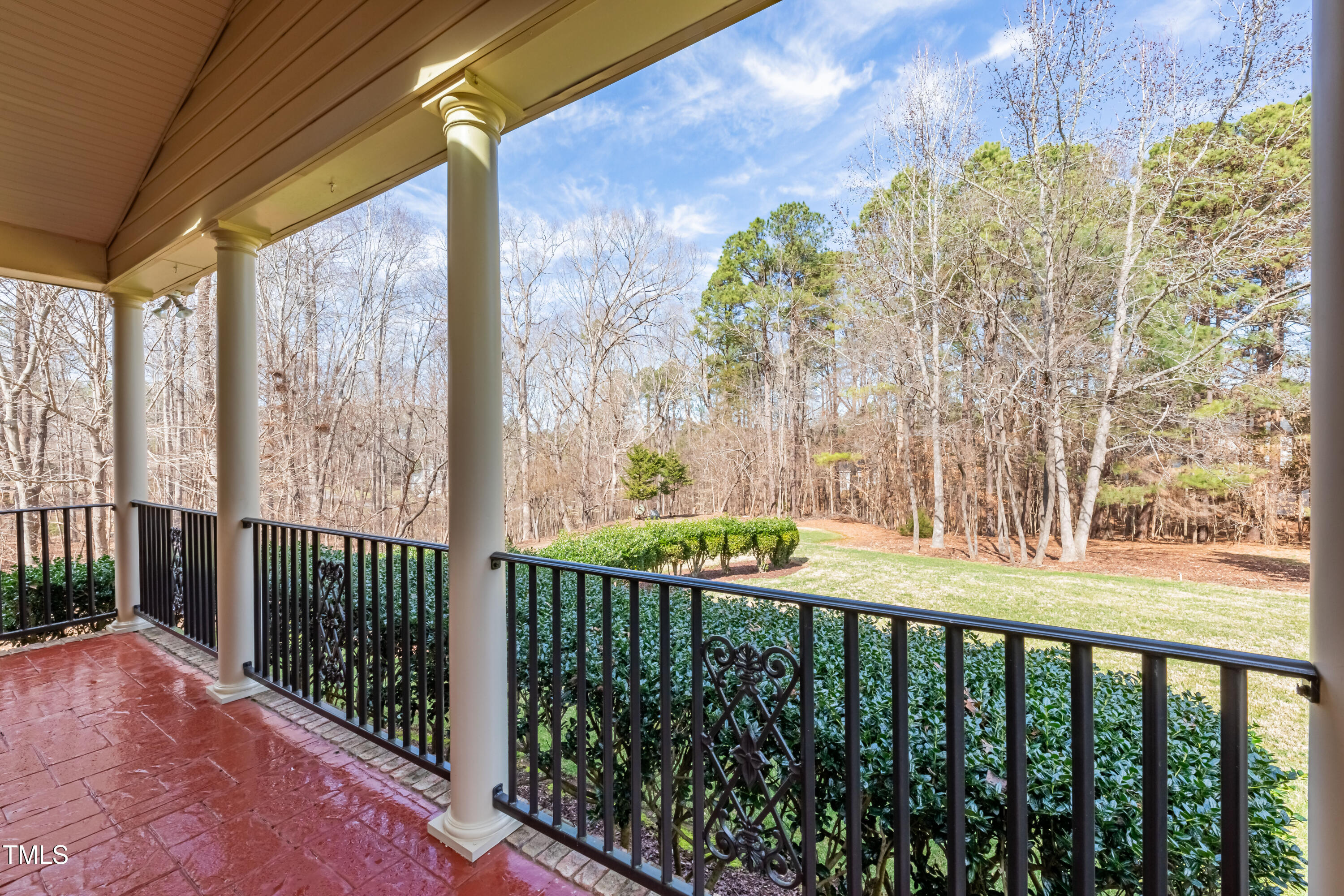 1408 Goldengate Court Raleigh, NC 27613 - Photo 50 of 64 a view of a porch with a floor to ceiling window
