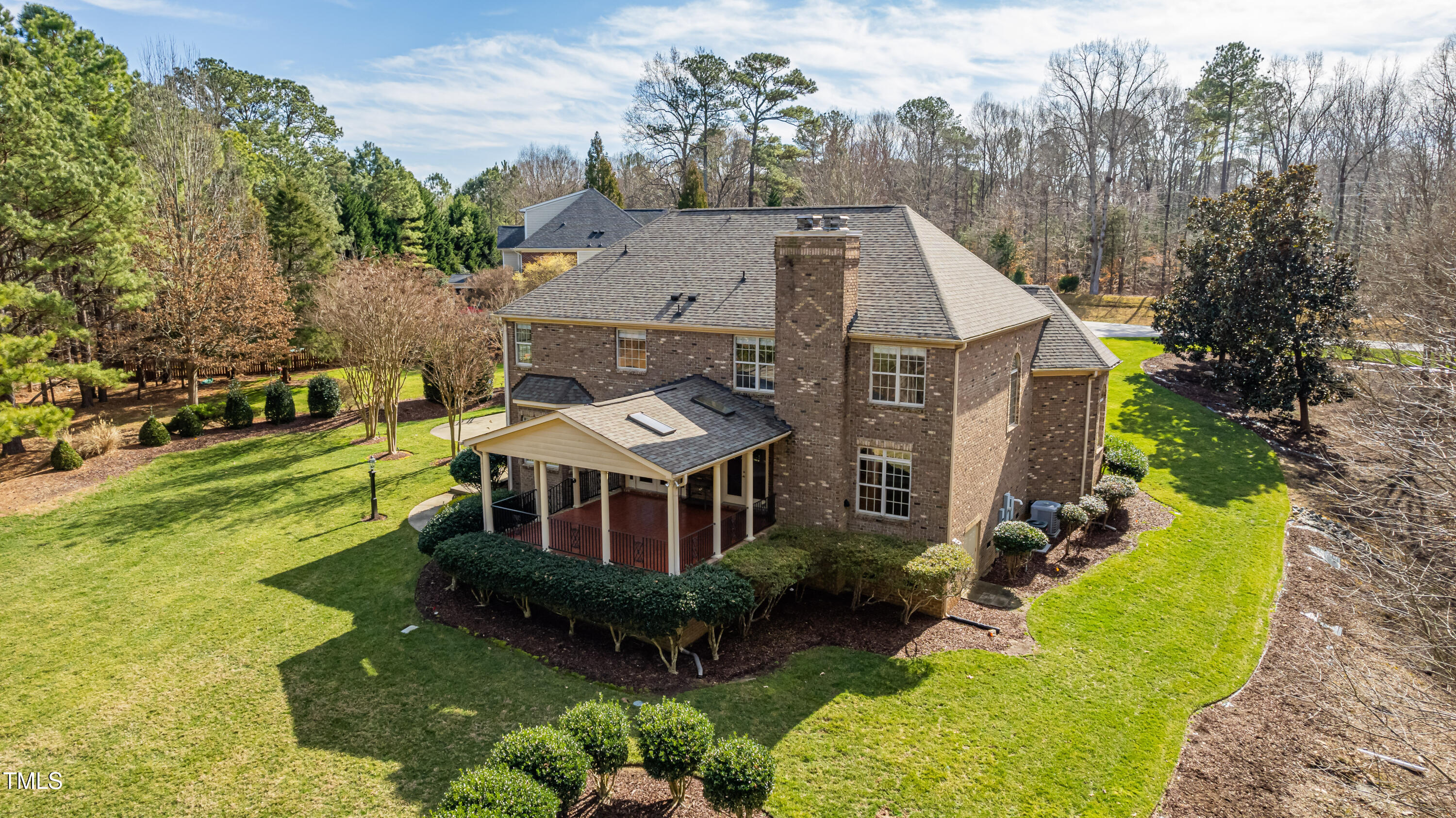 1408 Goldengate Court Raleigh, NC 27613 - Photo 59 of 64 an aerial view of a house with a big yard