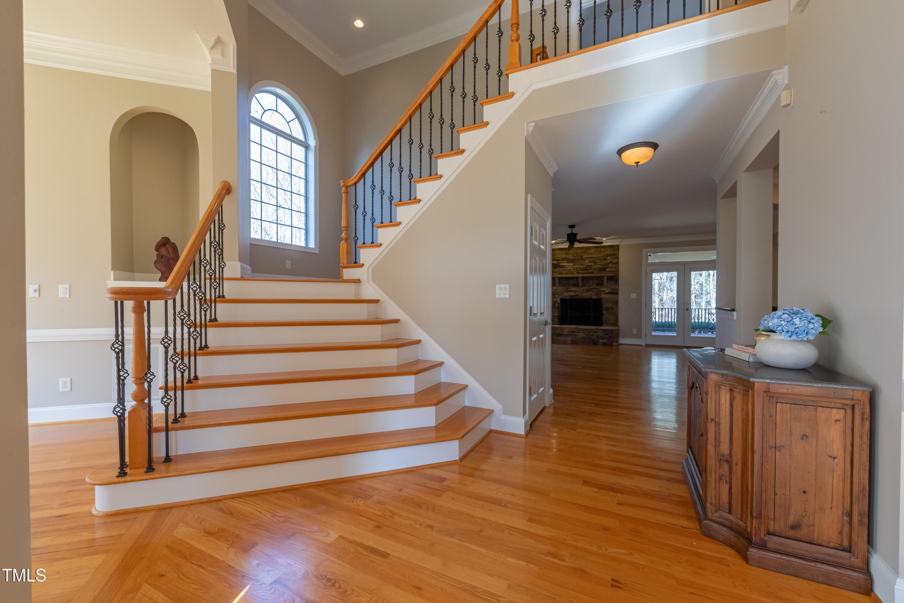 1408 Goldengate Court Raleigh, NC 27613 - Photo 6 of 64 a view of entryway and hall with wooden floor