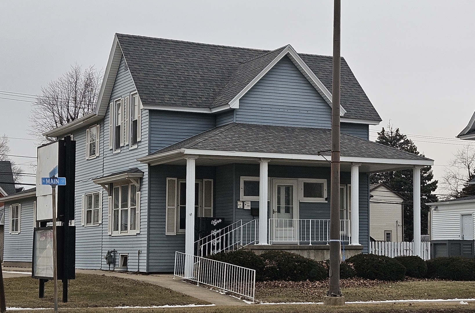 104 North Main Street, Unit C Princeton, IL 61356 - Photo 1 of 12 a front view of a house with a yard
