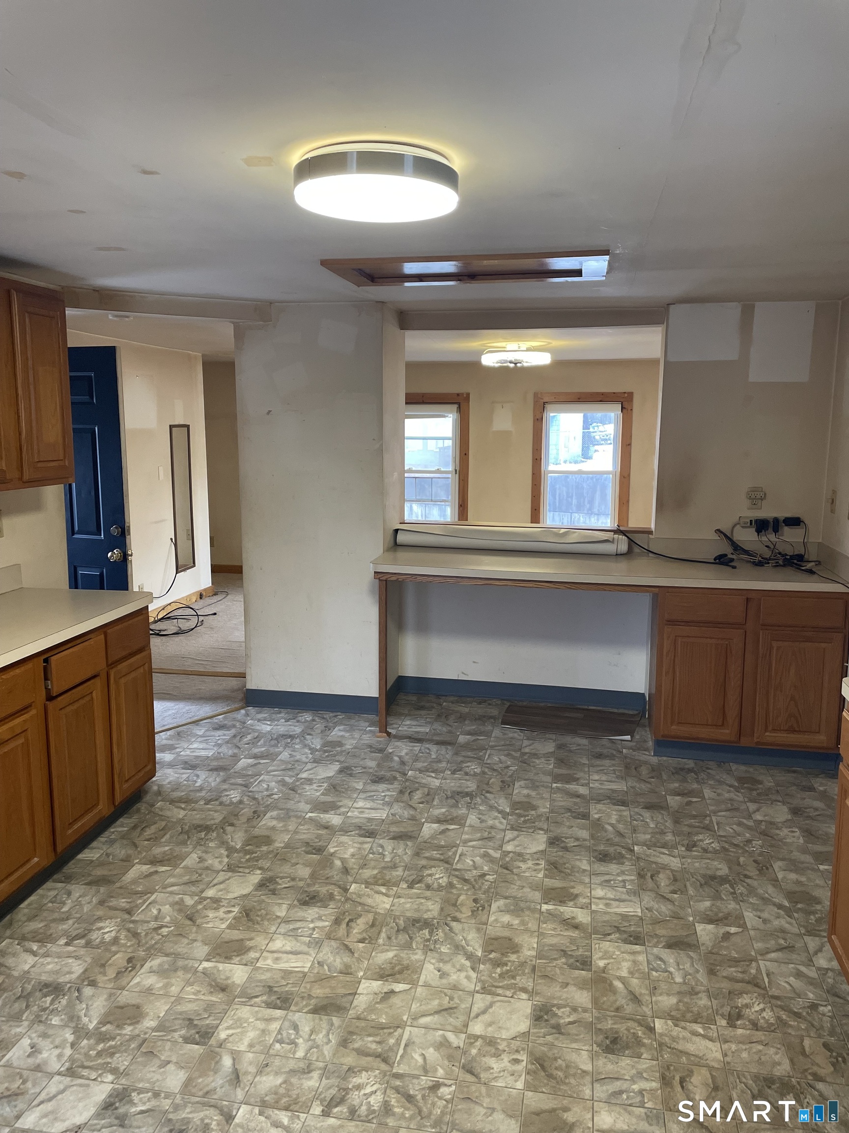 91 Division Street Ansonia, CT 06401 - Photo 16 of 22 a view of a kitchen with sink and cabinet